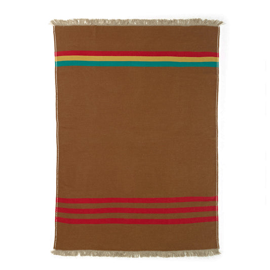 Cozy Manitoba Collection linen-wool throw featuring a neutral plaid background with bold red, green, and mustard stripes, finished with a flax-colored fringe. Crafted from premium Belgian Linen™, this throw combines softness and warmth, perfect for adding style to any room.