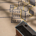 Load image into Gallery viewer, Handmade embroidered cotton tablecloth featuring connected houses, designed to evoke warmth and togetherness.