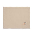 Charger l'image dans la visionneuse de la galerie, Set of four embroidered cotton placemats with playful snowman design, handmade for winter dining and festive tables.