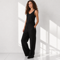Bild in Galerie-Betrachter laden, The Poppy Black linen tank top with cream poppy embroidery, model front view