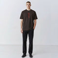Bild in Galerie-Betrachter laden, The Papyrus embroidered T-shirt in coal with hieroglyphic-style motif, front view
