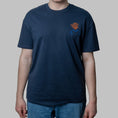 Load image into Gallery viewer, Navy organic cotton t-shirt with abstract head embroidery in orange and blue on chest, Gordina