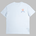 Load image into Gallery viewer, White organic cotton embroidered t-shirt with abstract head design in orange and blue, flat lay, Gordina