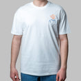 Load image into Gallery viewer, White organic cotton t-shirt with abstract head embroidery in orange and blue on chest, Gordina