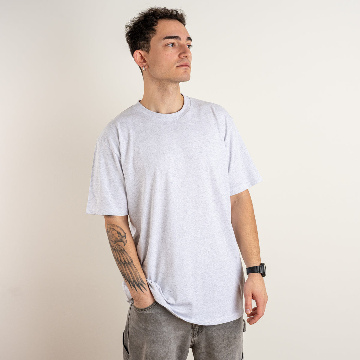 Model wearing the Gordina Garden and Water Marble Grey heavyweight T-shirt, front view.