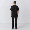 Charger l'image dans la visionneuse de la galerie, Undeciphered embroidered T-shirt in black, plain back view

