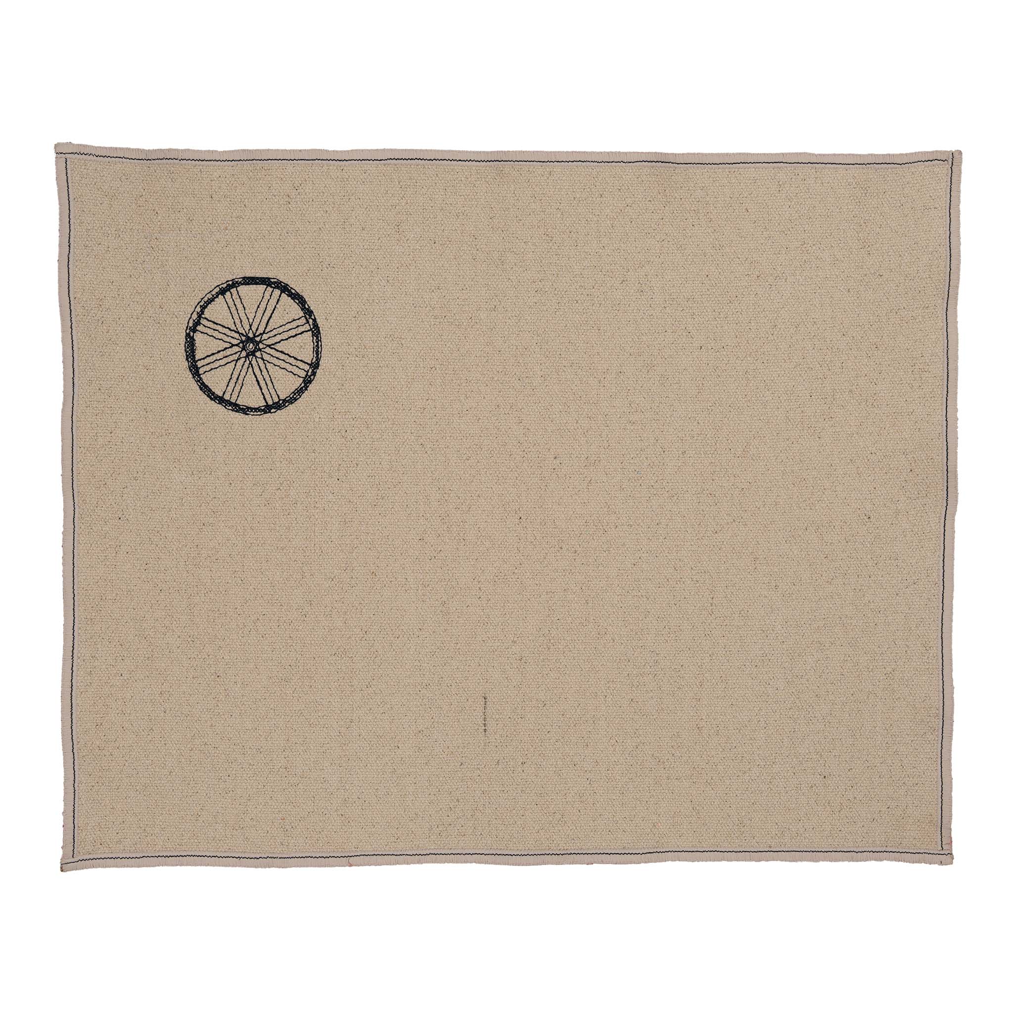 “Gordina beige cotton placemat with embroidered wheel motif – handcrafted table textile”