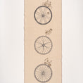 Bild in Galerie-Betrachter laden, Handmade embroidered cotton table runner with bicycle motif, designed in the Netherlands for winter gatherings.


