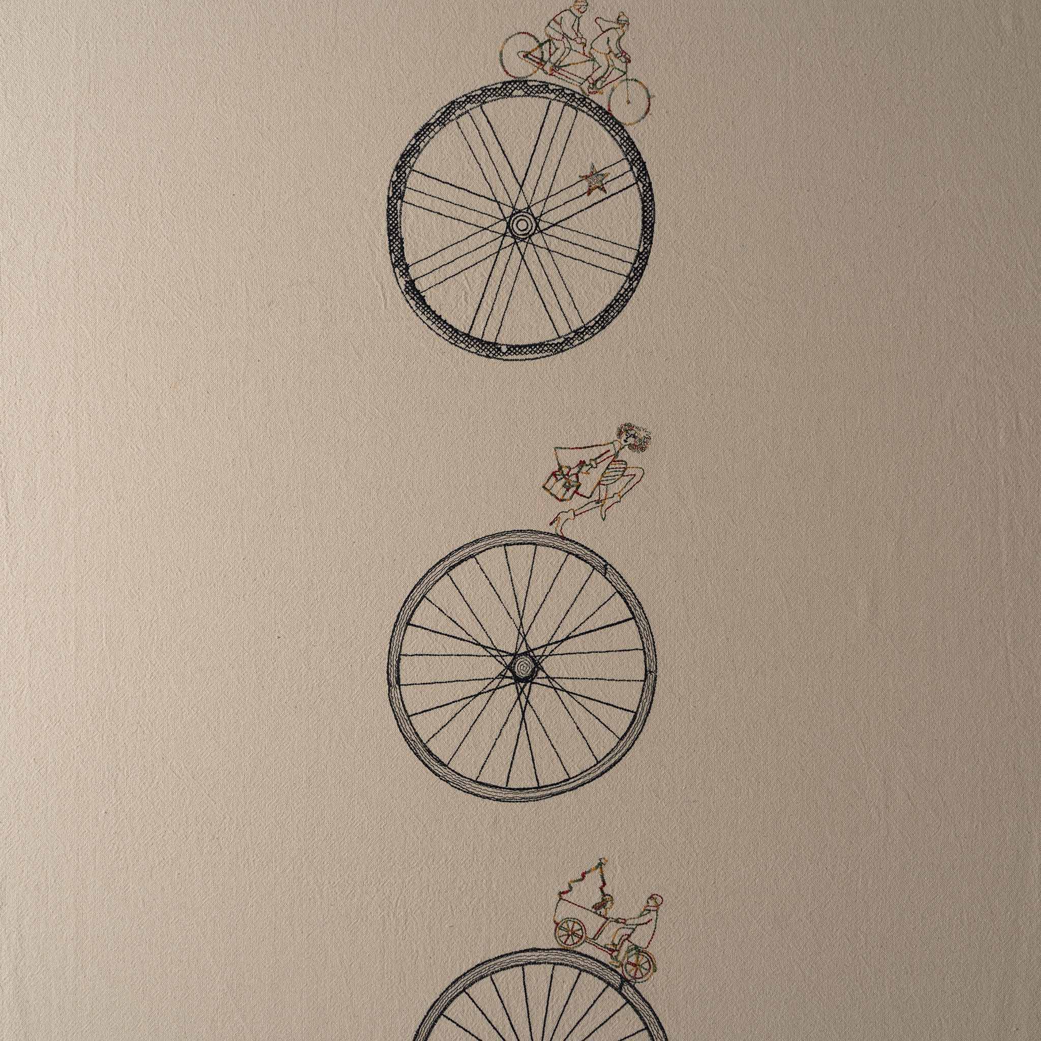 Large embroidered cotton tablecloth with bicycle motif, handmade in the Netherlands, celebrating movement and connection.
