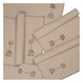 Bild in Galerie-Betrachter laden, Set of four embroidered cotton placemats with connected house motifs, celebrating family, home, and craftsmanship.

