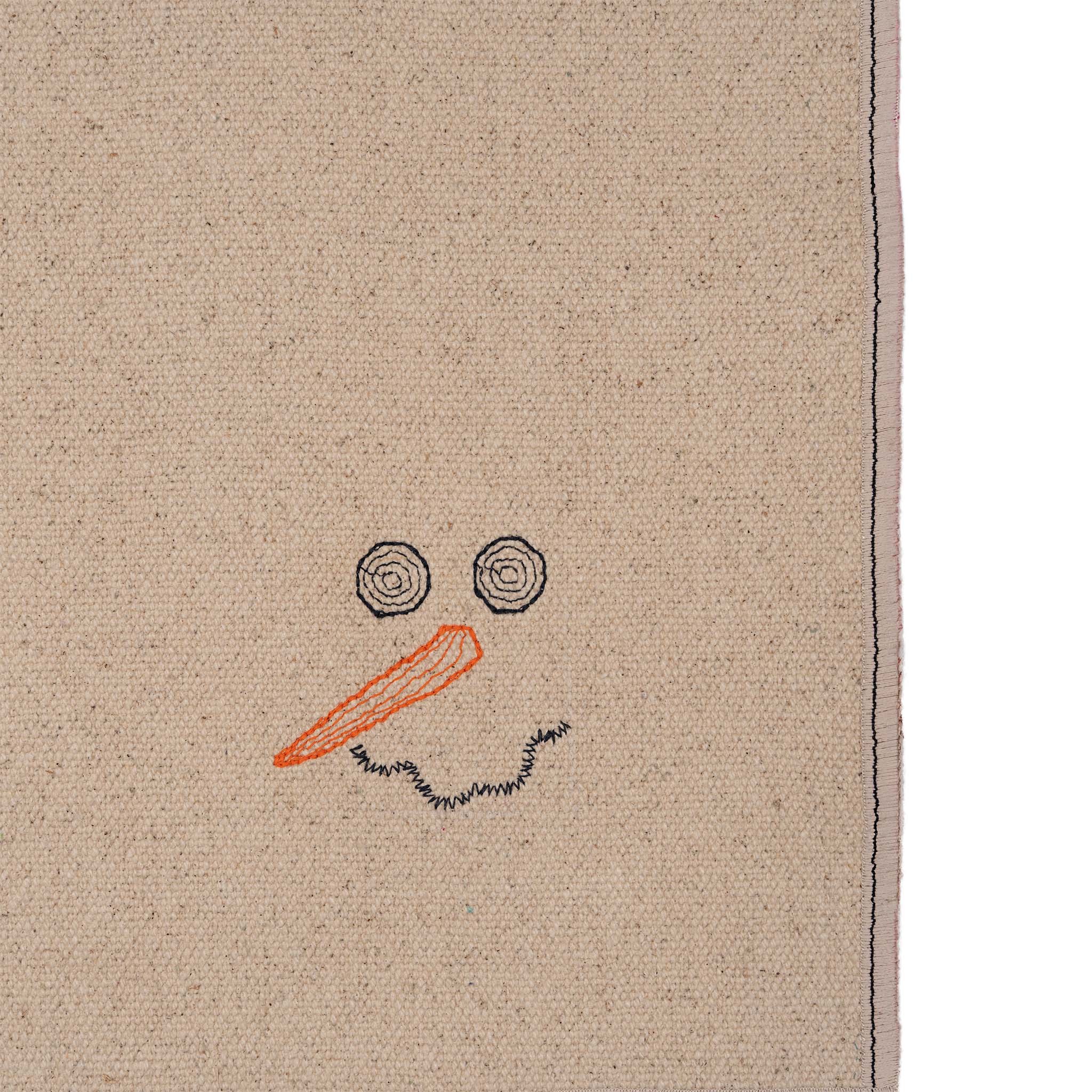 Set of four embroidered cotton placemats with playful snowman design, handmade for winter dining and festive tables.
