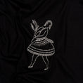 Load image into Gallery viewer, Close-up of individual cream stitches in the La Bailarina embroidery on black cotton
