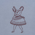 Load image into Gallery viewer, Macro detail of burgundy-thread embroidery on powder fabric for the La Bailarina dancing-figure motif

