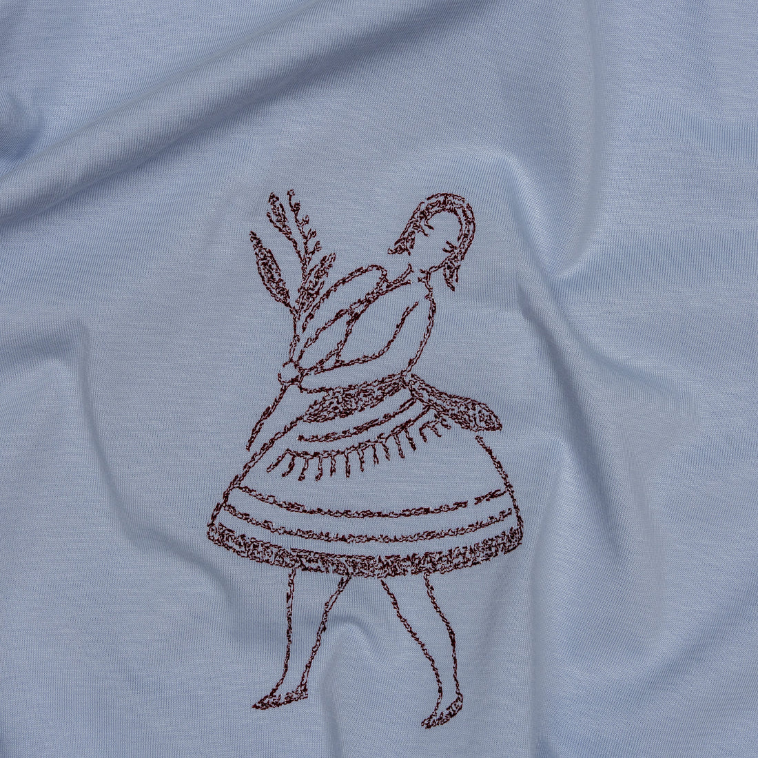 La Bailarina — close-up of embroidery on cotton