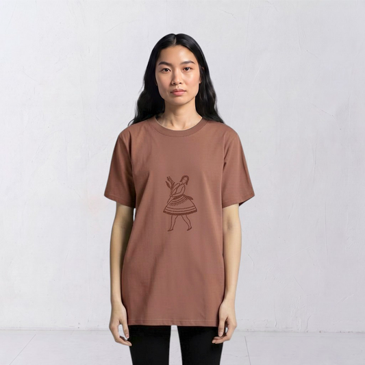 Model wearing the La Bailarina terracotta T-shirt with a dark-thread dancing figure embroidered at the centre chest