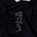 Bild in Galerie-Betrachter laden, Flat lay of The Papyrus women’s navy T-shirt showing the back motif placement
