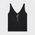 Bild in Galerie-Betrachter laden, Flat lay of The Poppy Black linen tank top showing the embroidered neckline
