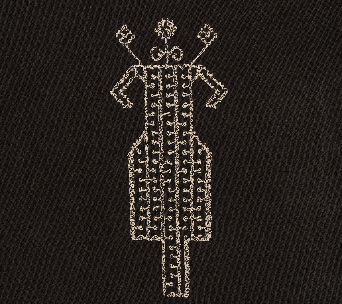 Wider cream embroidery detail on The Ward Faded Black women’s T-shirt