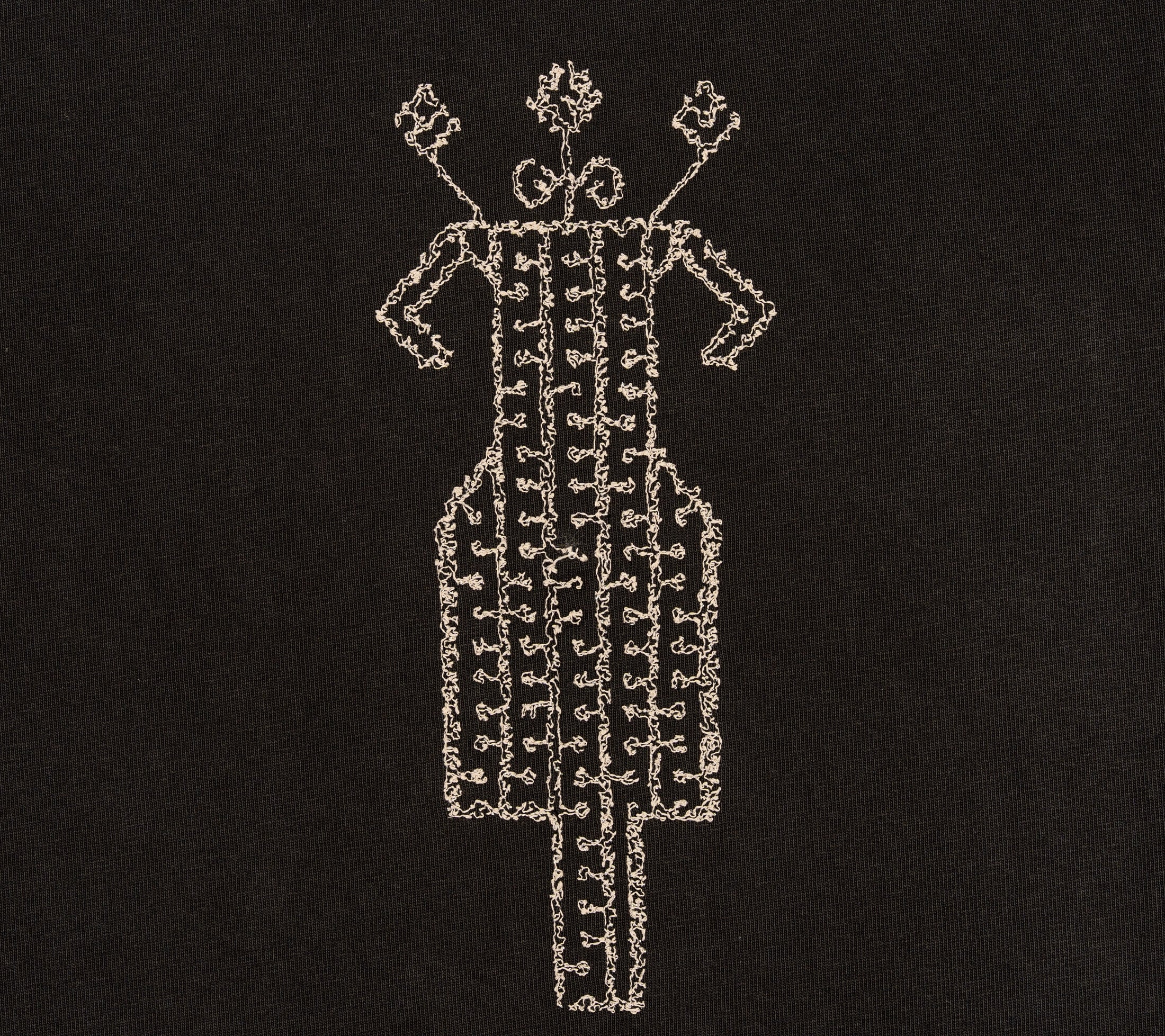 Wider cream embroidery detail on The Ward Faded Black women’s T-shirt