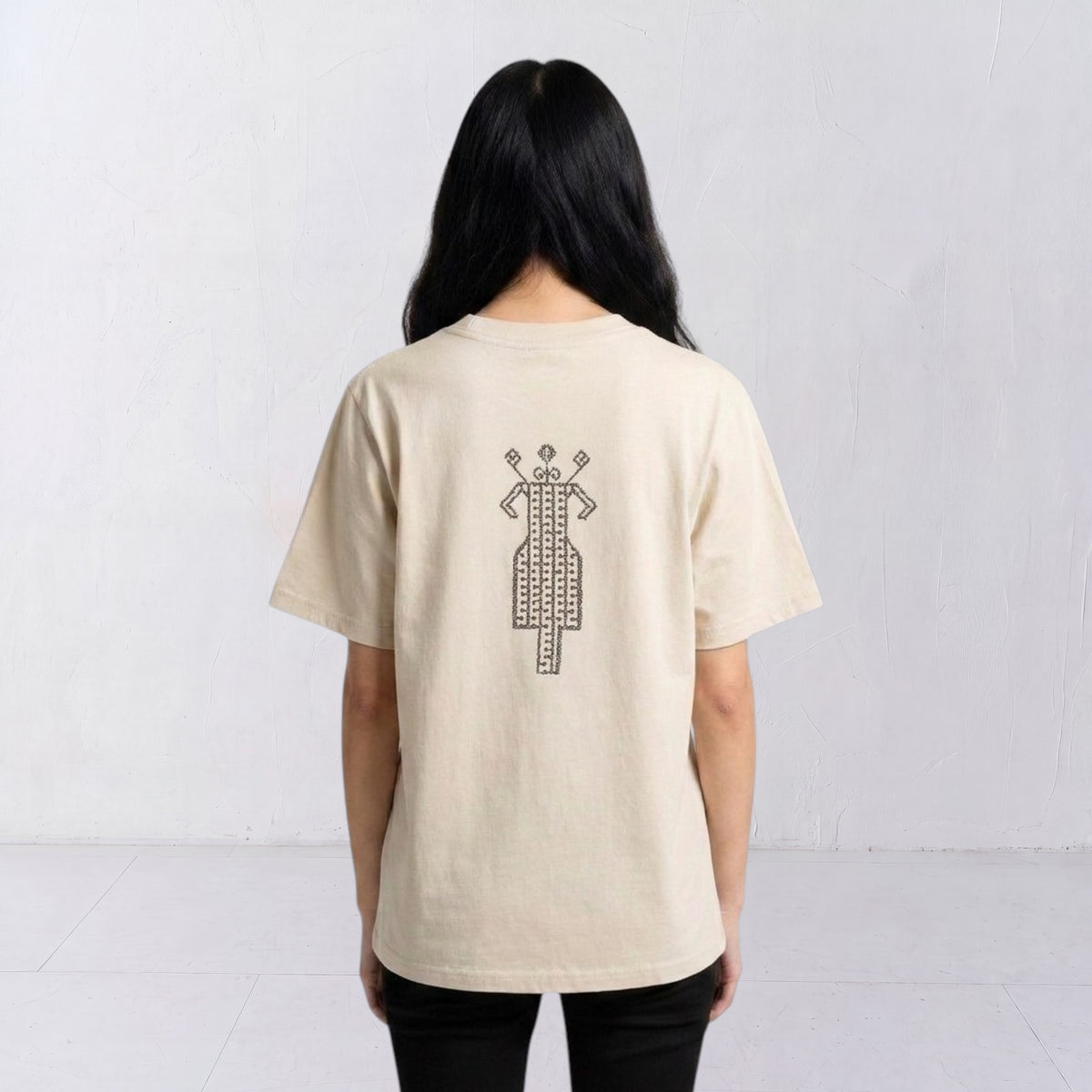 The Ward Faded Bone women’s T-shirt with reddish horse-and-rider embroidery, back view