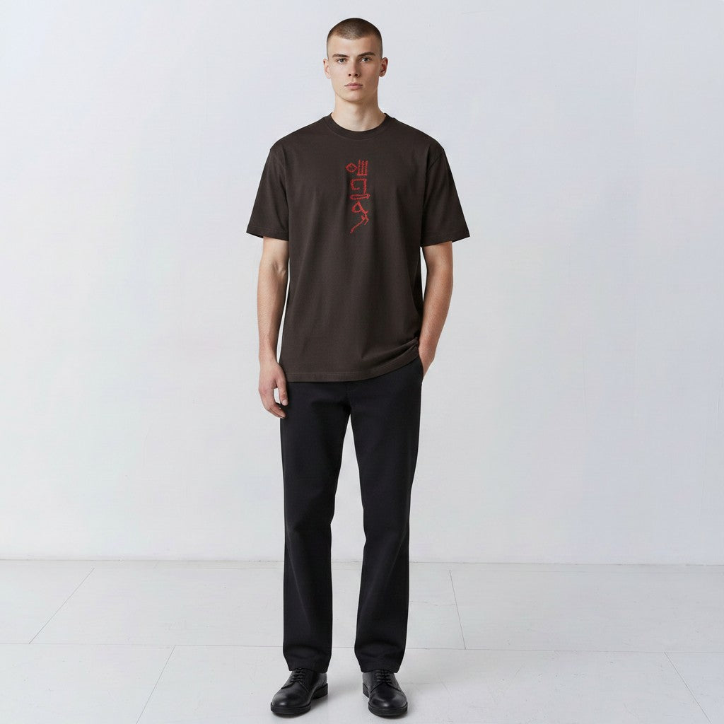 The Papyrus embroidered T-shirt in coal with hieroglyphic-style motif, front view