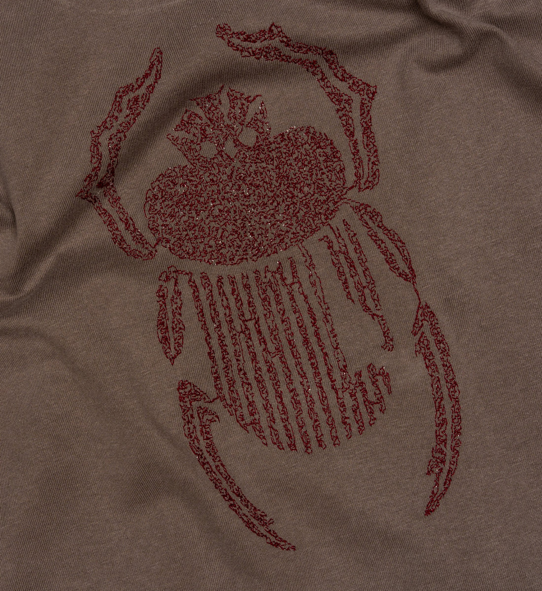 The Scarab — close-up of embroidery on cotton